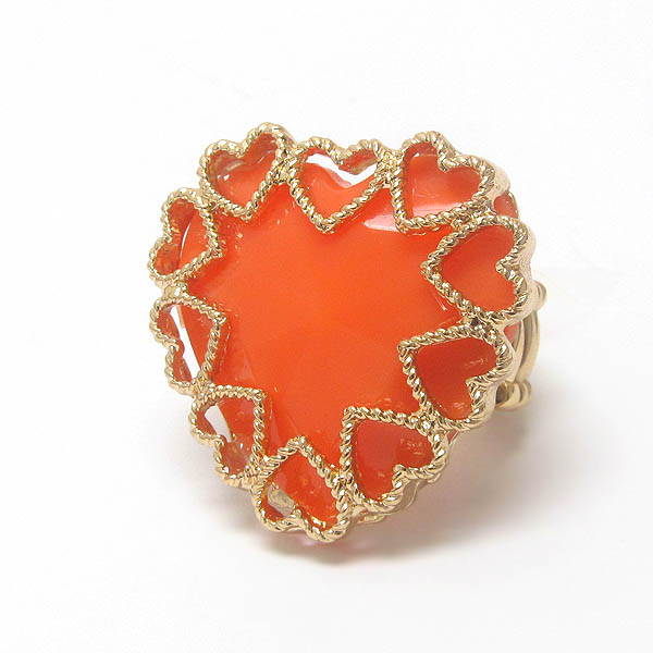 Metal filigree on heart stone stretch ring