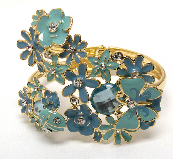 Multi crystal and metal epoxy flower with butterfly hinge bangle