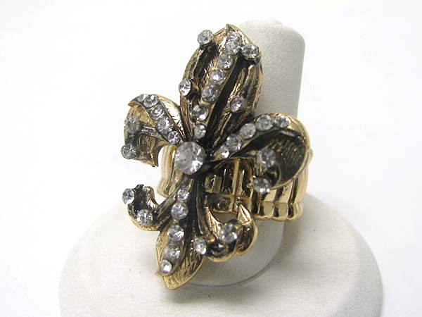 Crystal sud fleur de lis top stretch bnd ring