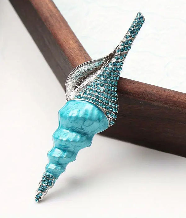 Conch shell brooch