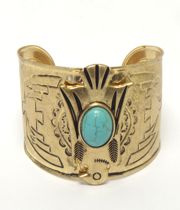 Turquoise center thunderbird metal cuff bracelet