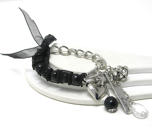 Multi charm ribbon tied pearl and metal chain ling bracelet