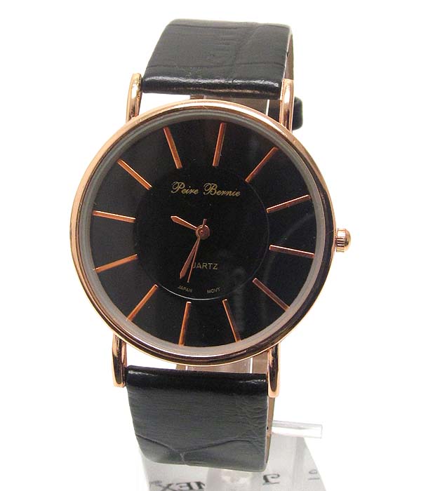 Simple round face and leather band watch