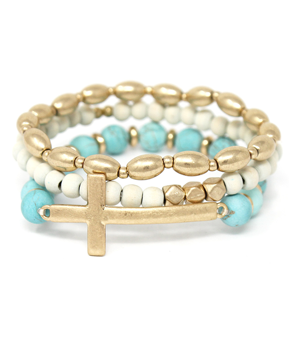 SEMI PRECIOUS STONE AND CROSS MEMORY WIRE COILED BRACELET