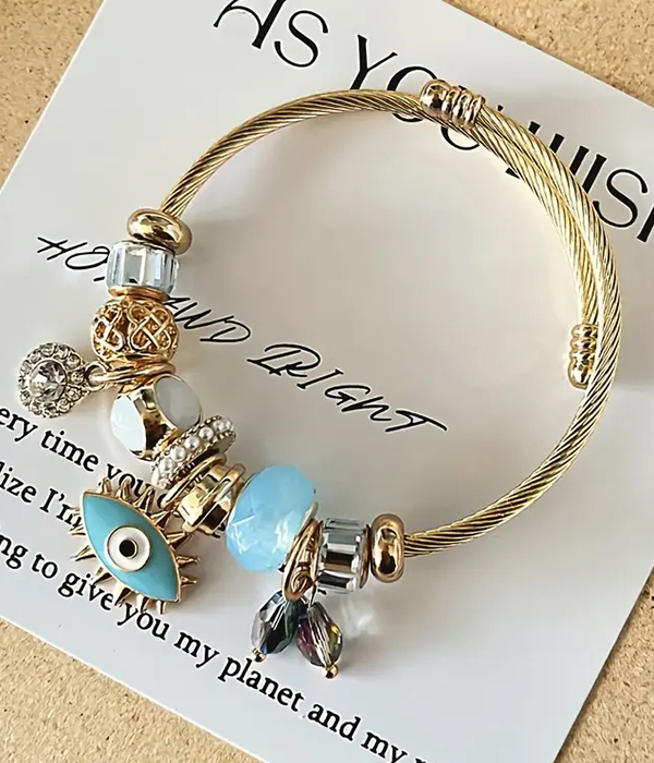Evil eye multi charm bangle bracelet