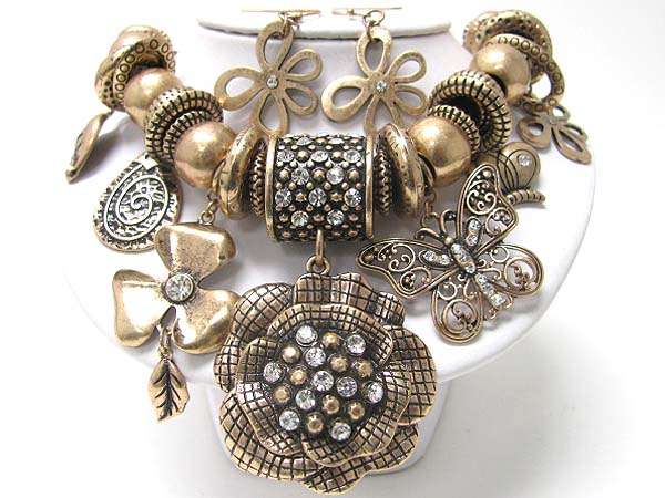 Antique look crystal stud multi burnish metal flower and butterfly dangle cord necklace set
