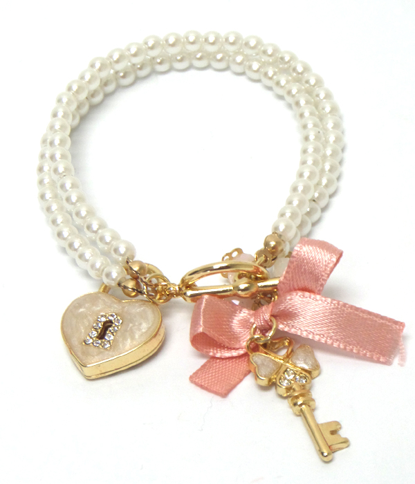 Designer inspired two rows of pearls with charm heart bracelet