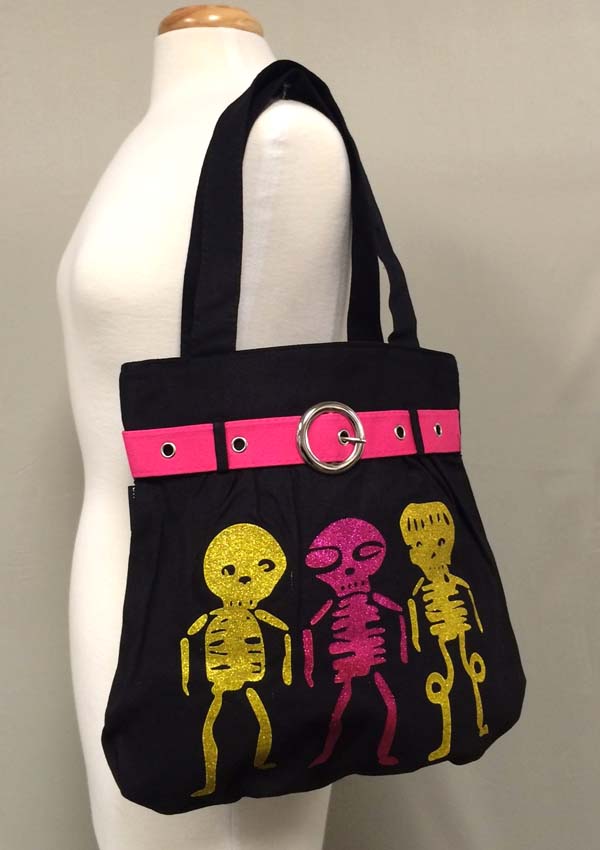 Three skull and skeleton and belt accent zipper top tote bag