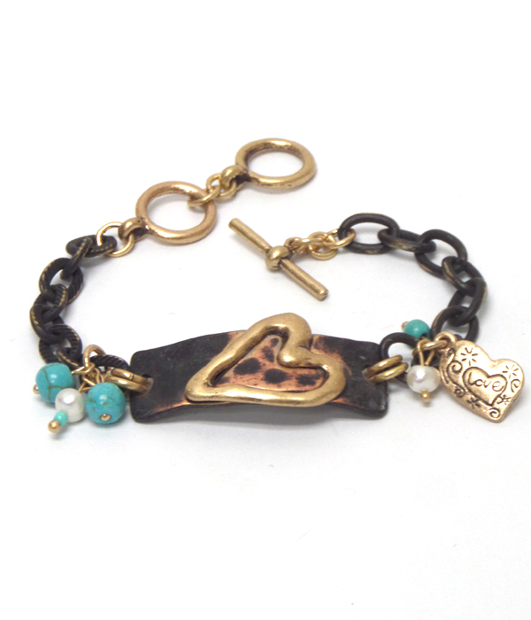 Textured metal with turquoise stone toggle bracelet