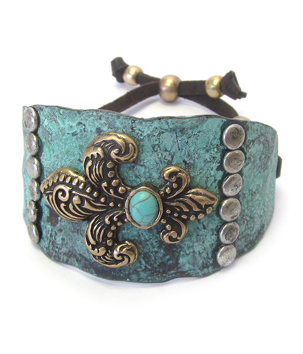 Textured chunky metal and suede pull tie bracelet - fleur de lis