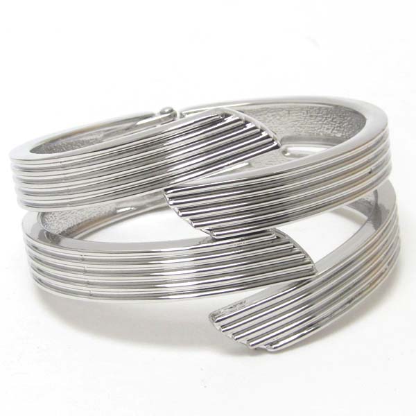 Architectural metal hinge bangle bracelet