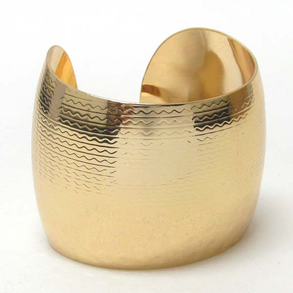 Textured wide metal bangle bracelet
