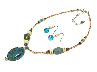 Figurine and  acrylic bead seed bead necklace and earring set