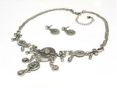 Antique style crystal and multi metal charm drop necklace and earring set