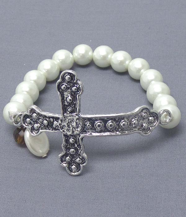 Vintage metal cross and pearl stretch bracelet