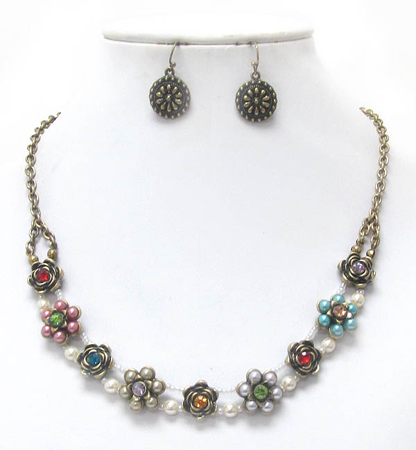 Multi pearl and crystal center flower link necklace earring set