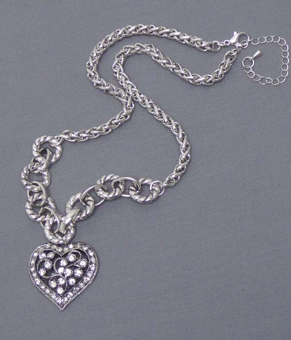 Crystal on metal filigree heart necklace