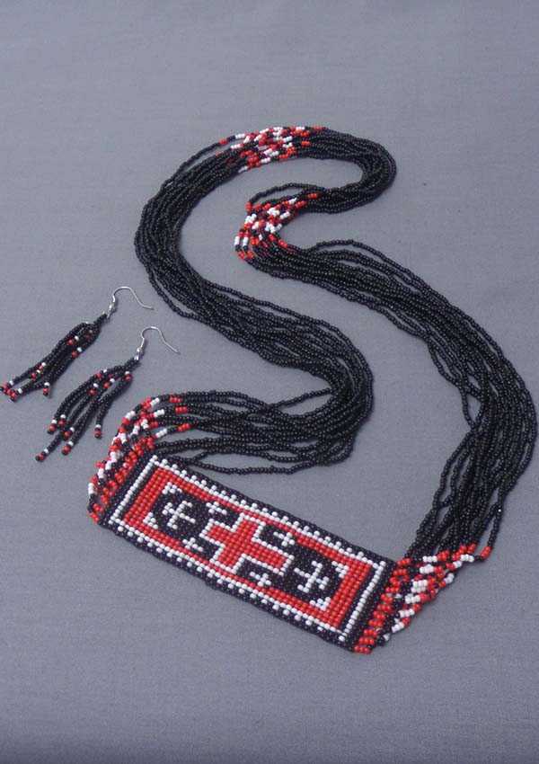 Multi layered seed bead chain and cross necklace earring set