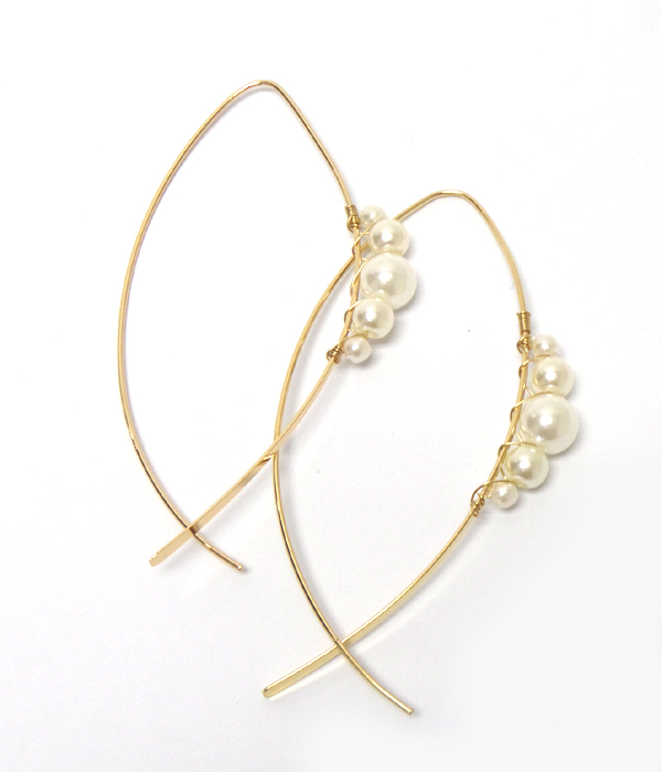 Pearl and wire hoop earring