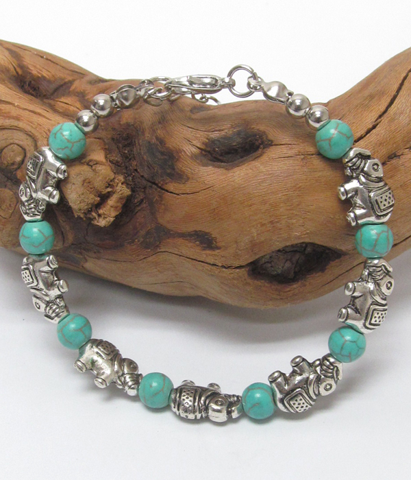 Handmade turquoise and tibetan silver bracelet