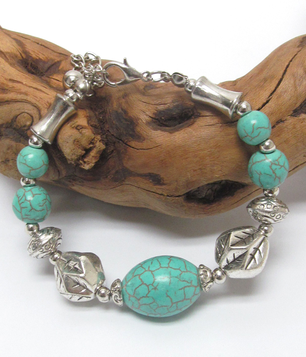 Handmade turquoise and tibetan silver bracelet