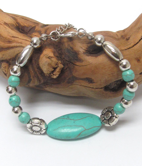 Handmade turquoise and tibetan silver bracelet