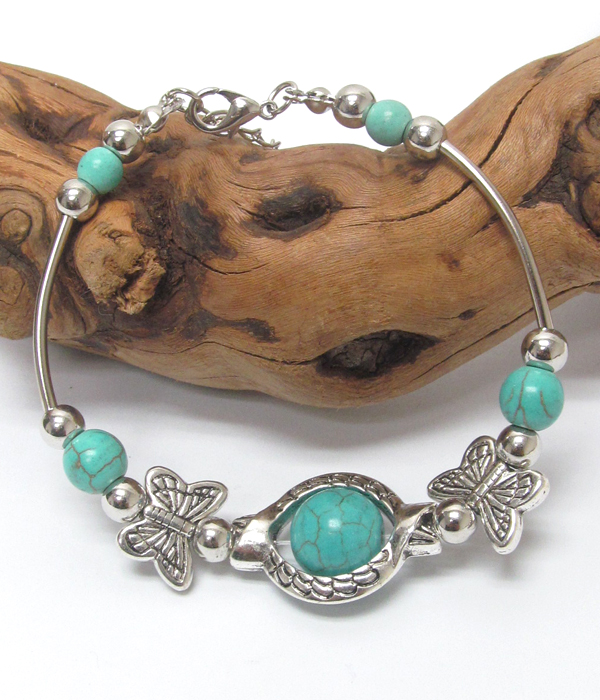 Handmade turquoise and tibetan silver bracelet