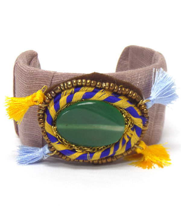 Large semi precious stone fbric wrapped with tassel cuff bangle bracelet - brass