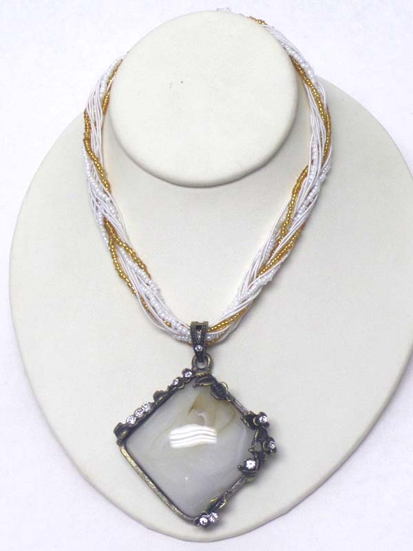 Puffy stone and crystal edge pendant and multi seed bead chain mix necklace