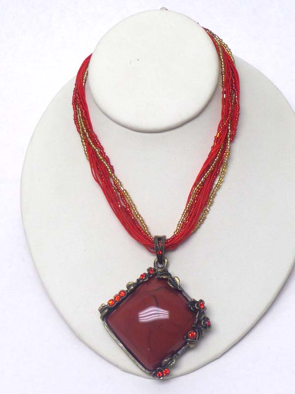 Puffy stone and crystal edge pendant and multi seed bead chain mix necklace