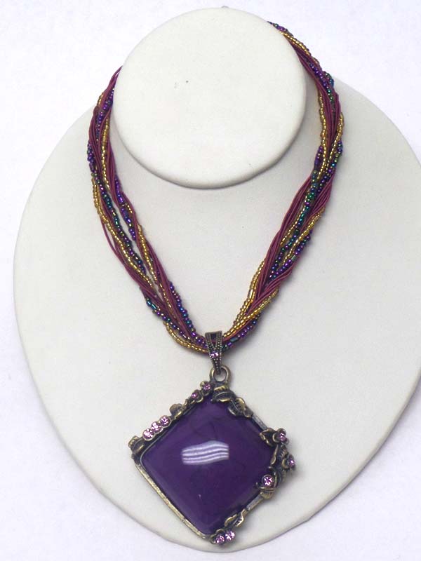 Puffy stone and crystal edge pendant and multi seed bead chain mix necklace