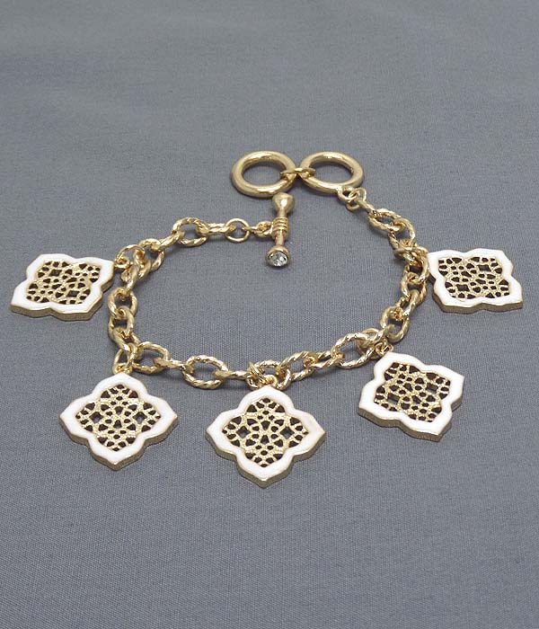 Metal filigree and epoxy flower charm toggle bracelet