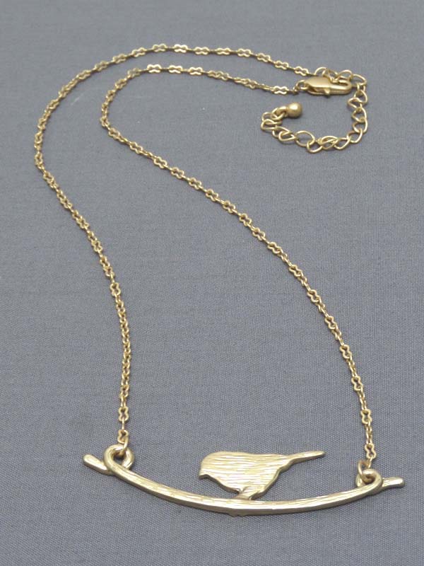 Bird on branch pendant necklace