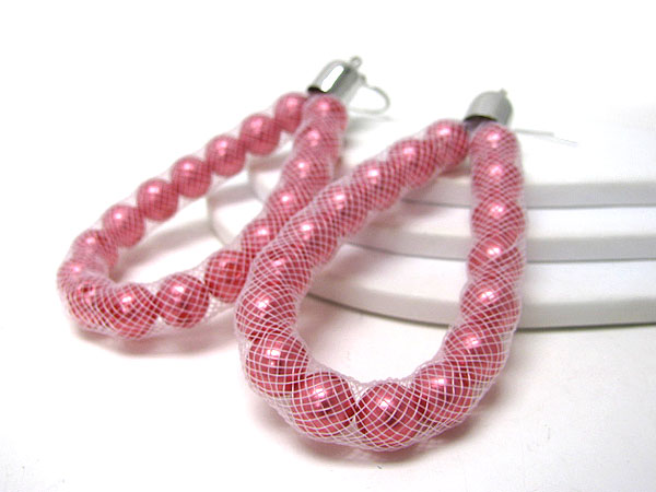 COLORED PEARL IN FABRIC NET TUBE EARRINGS