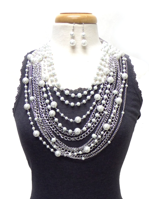 Bold multi chain and pearl layers necklace set