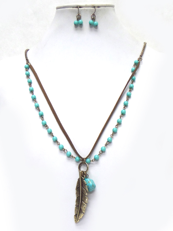 Metal feather leatherette and turquoise necklace set