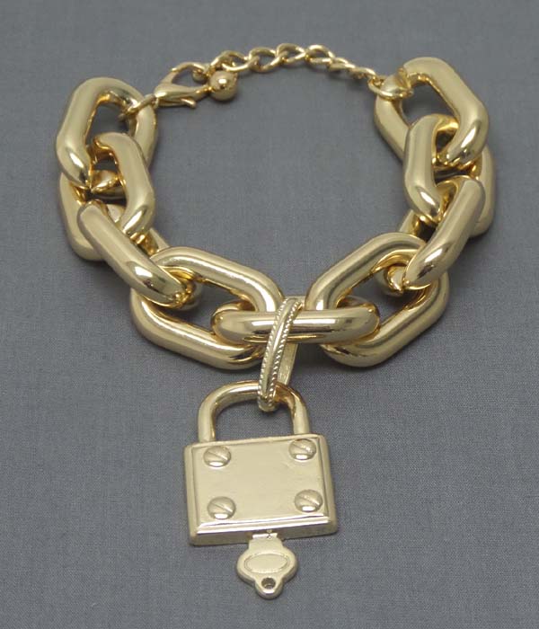 Thick chain and lock and key charm bracelet