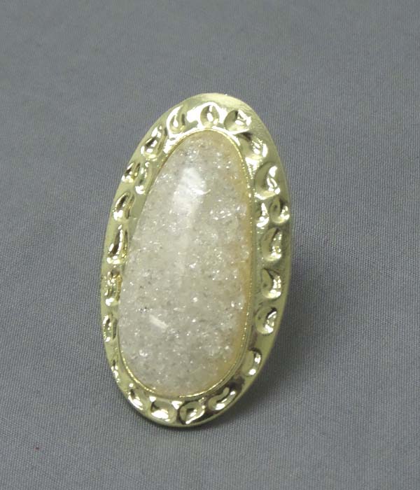 Natural shape stone and textured metal adjustable ring