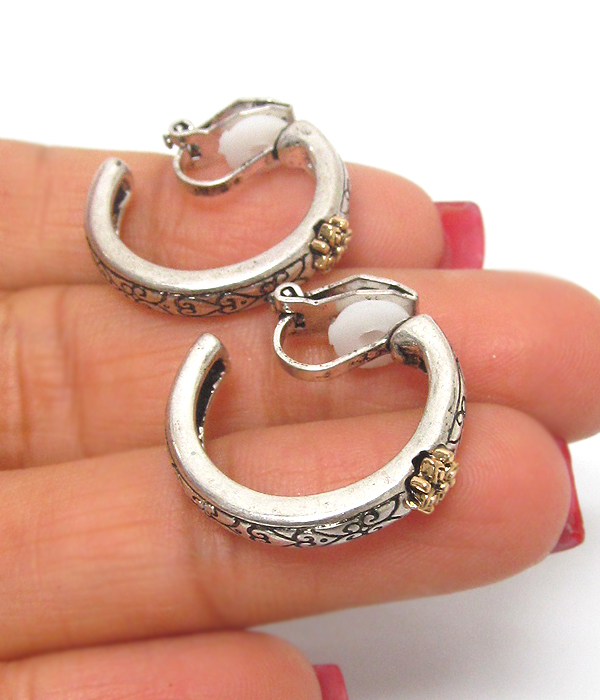 Metal textured hoop clip on earrings