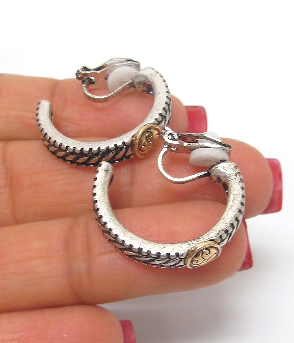 Metal textured hoop clip on earrings 