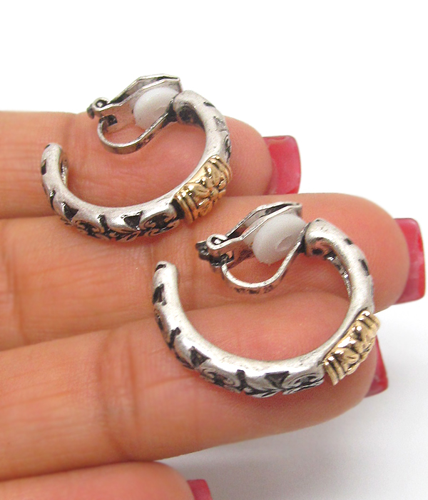 Metal textured hoop clip on earrings 