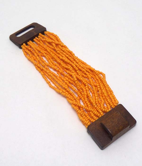 Seed bead multi layer and wood closure stretch bracelet