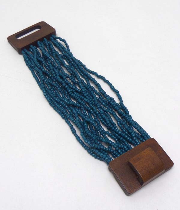 Seed bead multi layer and wood closure stretch bracelet