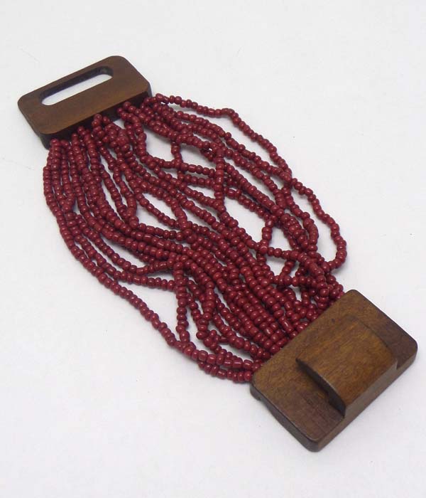 Seed bead multi layer and wood closure stretch bracelet