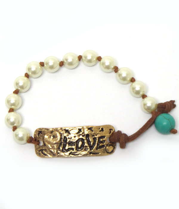 Handmade hammered love plate and turquoise band bracelet