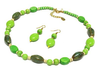 Figurine and acyrlic and wood beads necklace and earring set