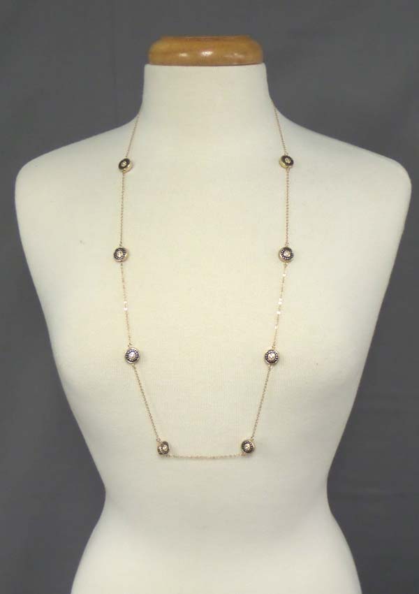 Crystal center metal filigree disk link long station necklace