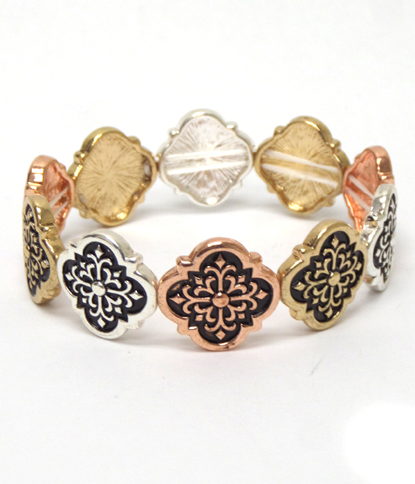 Quatrefoil shape metal filigree bracelet 