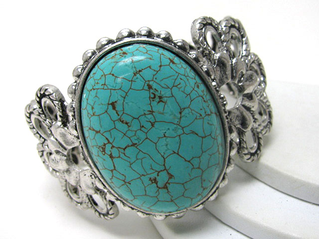 Turquoise oval stone filigree metal stretch bracelet