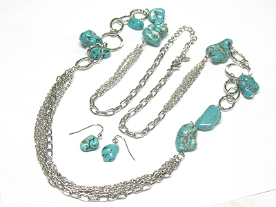 Turquoise stone and multi strand chain link necklace and earring set